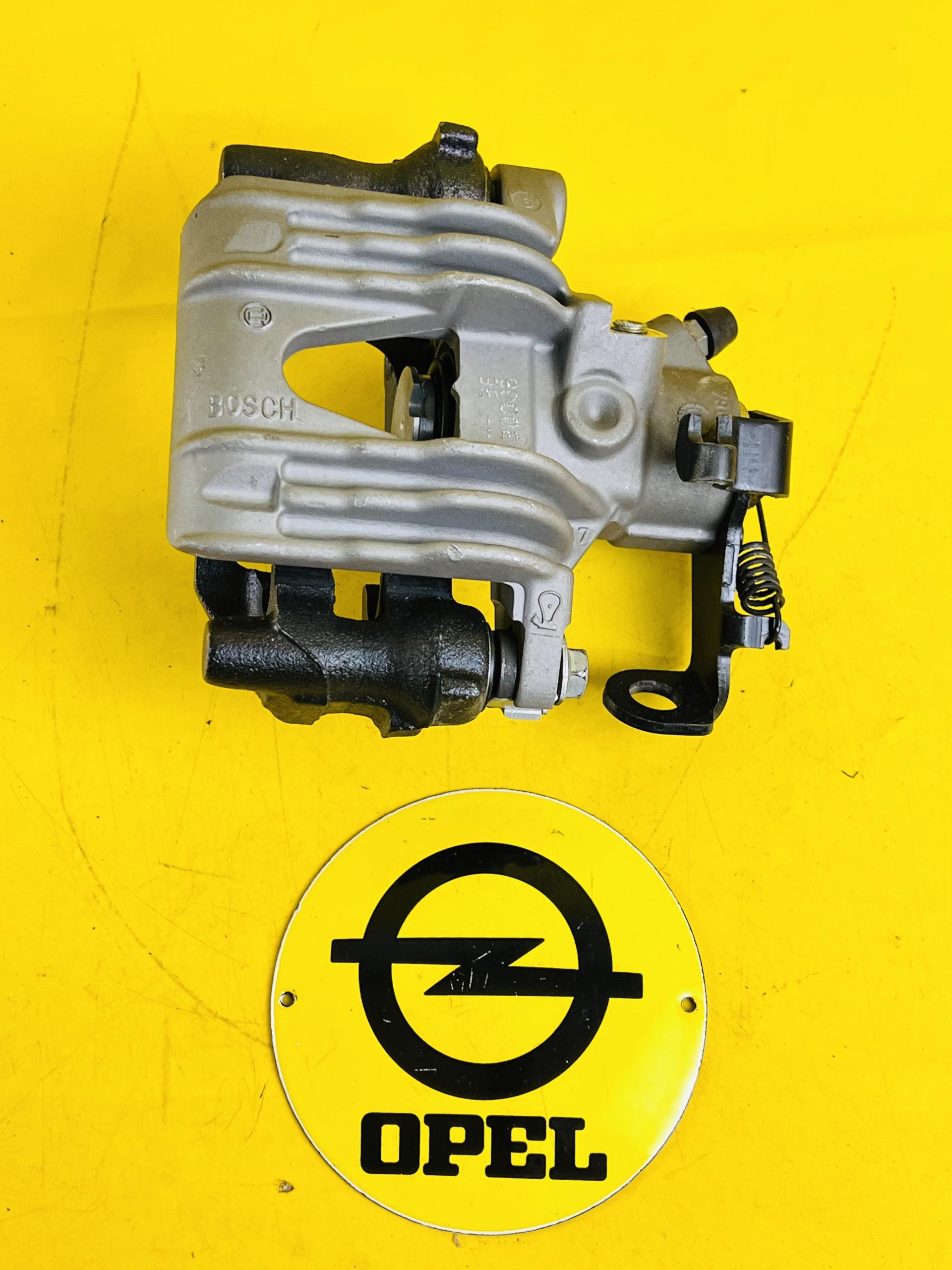 ATEC Germany 1x Bremssattel hinten rechts mit integrierter Feststellbremse  Bremszange, Kompatibel mit OPEL ASTRA G Caravan (T98), ASTRA G CC (T98)