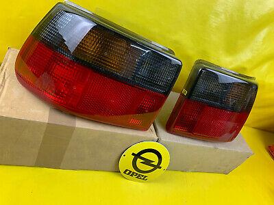 ID_36118_orig.jpg NEU+ORIGINAL OPEL Astra F GSi SATZ Rücklicht dunkel getönt schwarz rechts links
