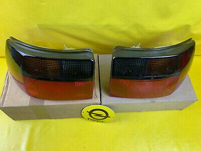 ID_36119_orig.jpg NEU+ORIGINAL OPEL Astra F GSi SATZ Rücklicht dunkel getönt schwarz rechts links