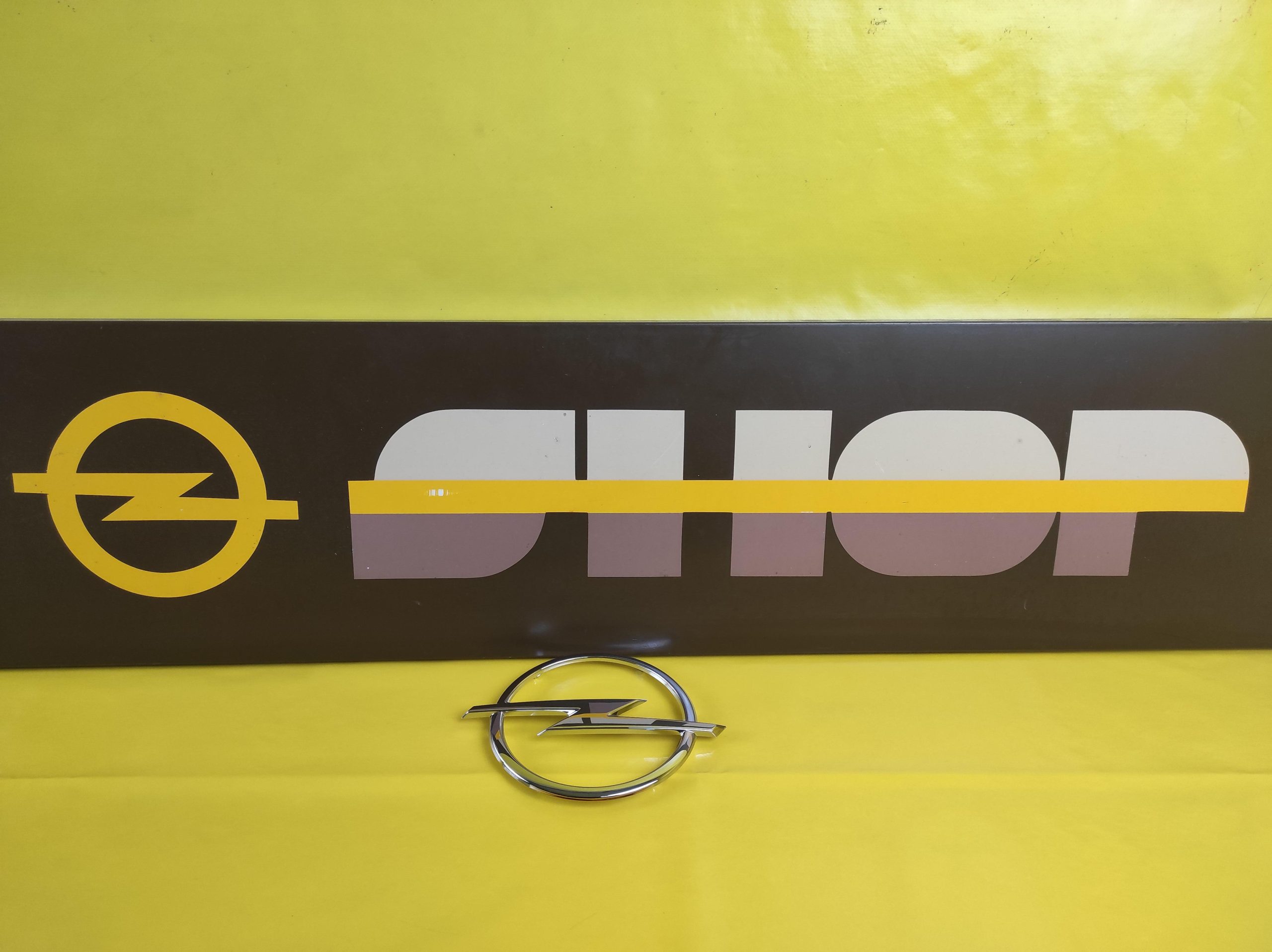 ID_83149_orig-1.jpg Emblem Opel Astra H Kühlergrill Opelzeichen Kühlergitter GM 13142521 Neu Original