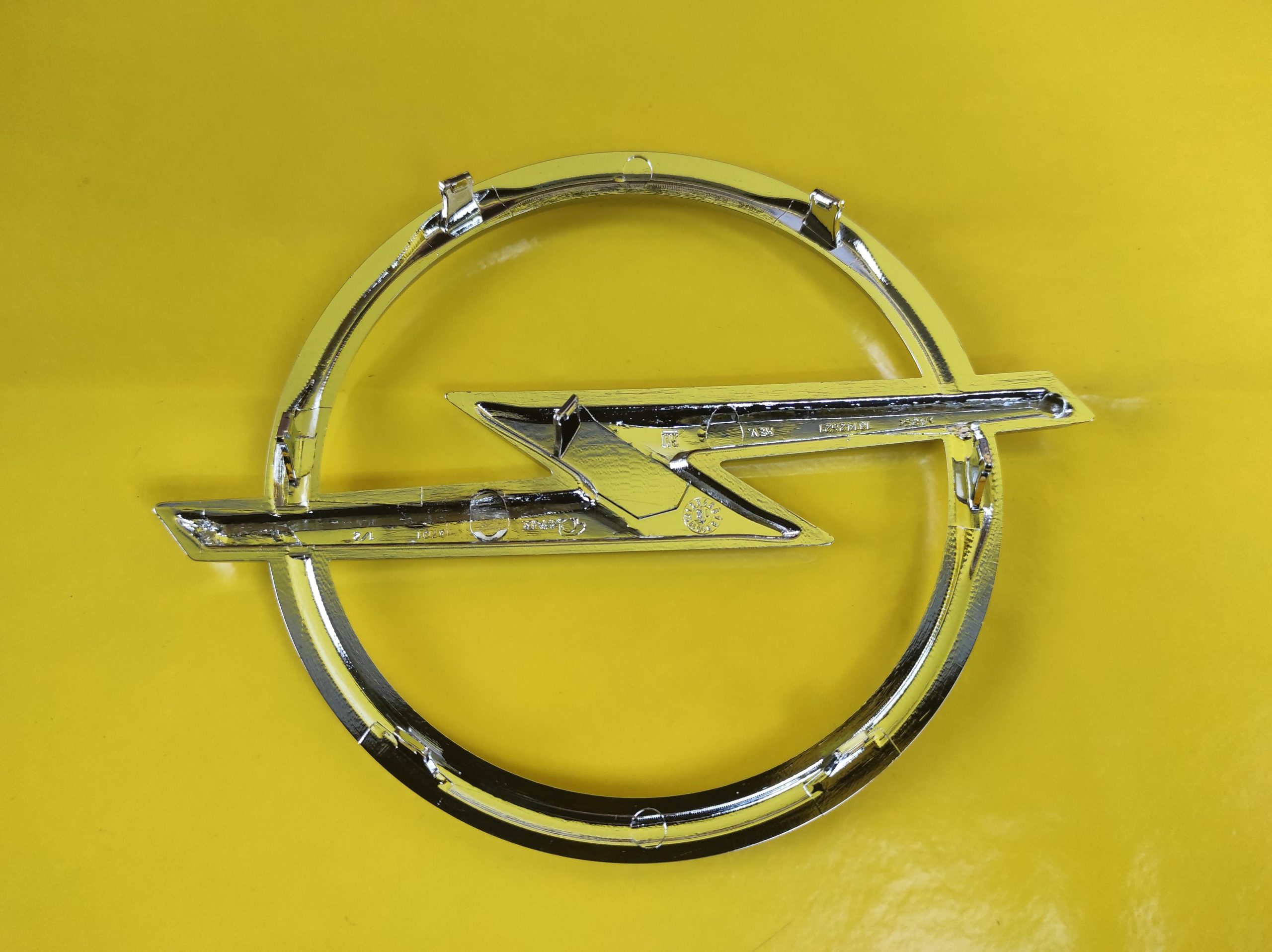 ID_83151_orig-1.jpg Emblem Opel Astra H Kühlergrill Opelzeichen Kühlergitter GM 13142521 Neu Original