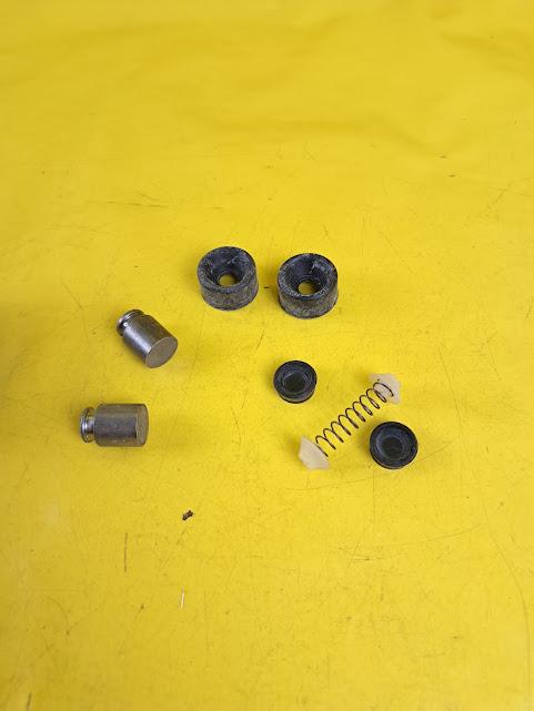 ID_98693_orig.jpg Reparatursatz Radbremszylinder hinten Opel Corsa A Kadett E Original Neu