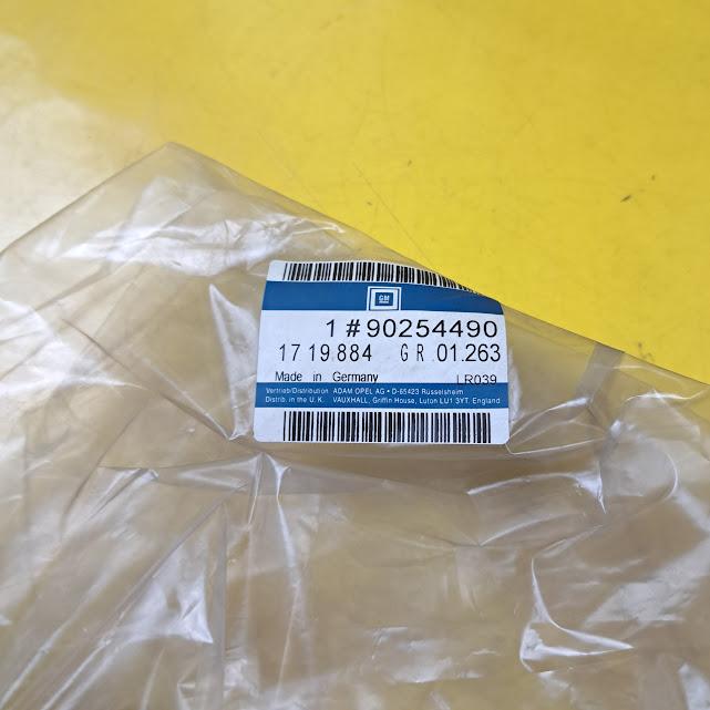 ID_137867_orig.jpg Frontspoiler Opel Ascona C ab Bj. 1987 unten links Spoileransatz GM 90254490 Original Neu